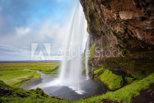 Fototapeta   Passage under waterfall Seljalandsfoss