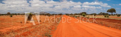 Fototapeta Red road in Tsavo East National Park, Kenya