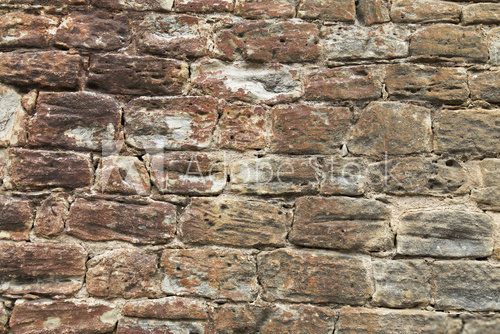 Fototapeta Red stone wall textured background