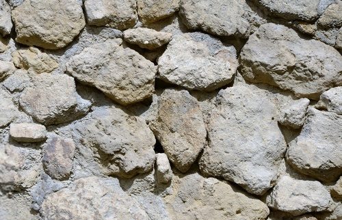 Fototapeta Rustykalna ściana z kamiennych bloków