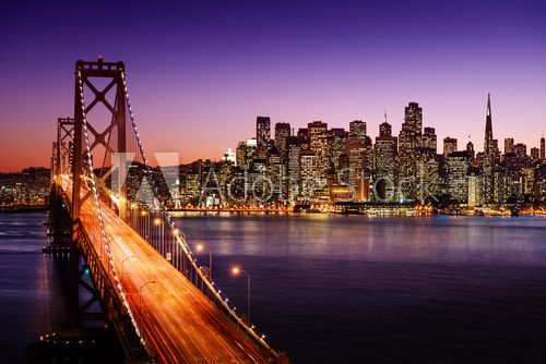 Fototapeta San Francisco skyline and Bay Bridge at sunset, California