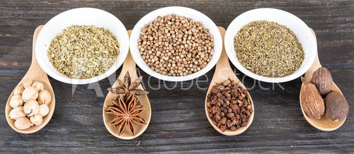 Fototapeta Spices and herbs in  bowls.
