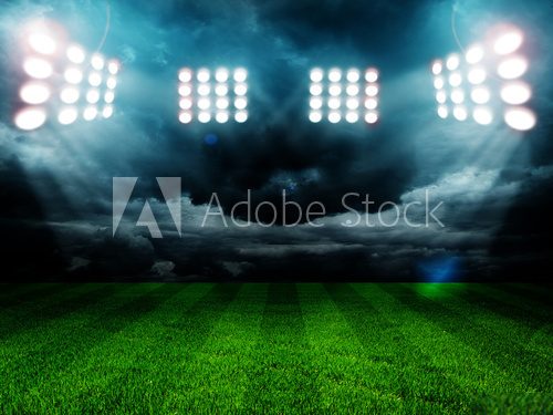 Fototapeta stadium lights at night and stadium