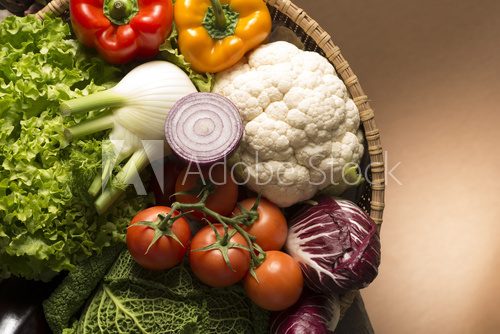 Fototapeta still life with vegetables isolated on brown background