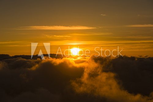 Fototapeta Sunset Above Clouds Haleakala National Park Maui Hawaii USA