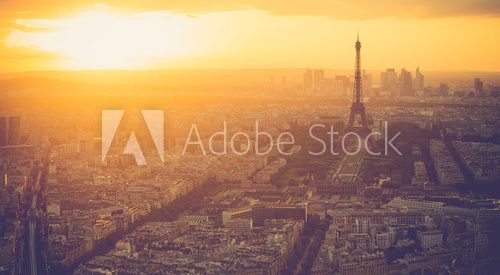Fototapeta Sunset at Eiffel Tower in Paris with vintage filter