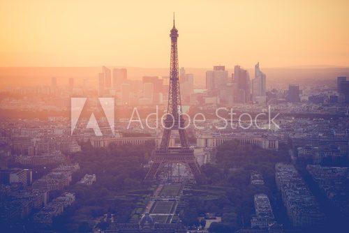 Fototapeta Sunset at Eiffel Tower in Paris with vintage filter