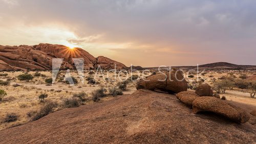 Fototapeta Sunset in the savanna in Namibia