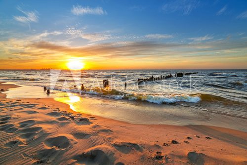 Fototapeta Sunset on the beach at Baltic Sea in Poland