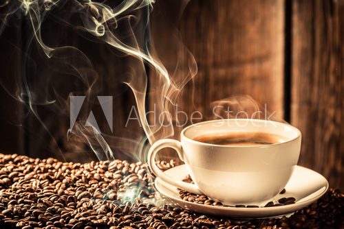 Fototapeta Taste cup of coffee with roasted grains