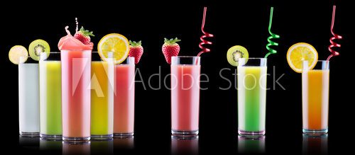 Fototapeta tasty summer fruits with juice in glass