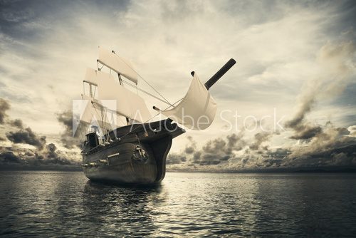 Fototapeta The ancient ship in the sea