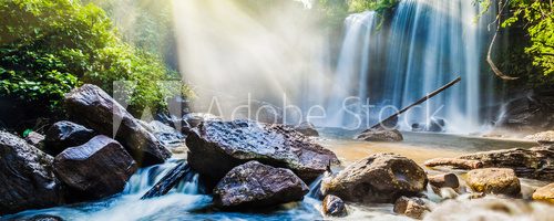 Fototapeta Tropical waterfall in jungle panorama