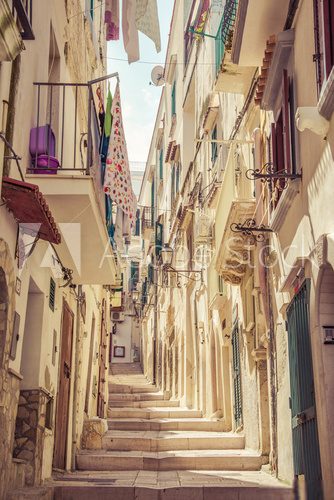 Fototapeta Typical italian medieval street.Apulia,Vieste, south Italy