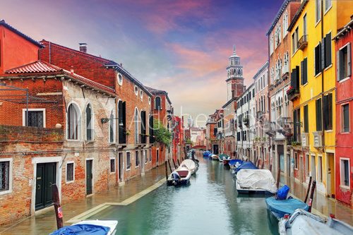 Fototapeta Venice landmark, canal, colorful houses and boats, Italy