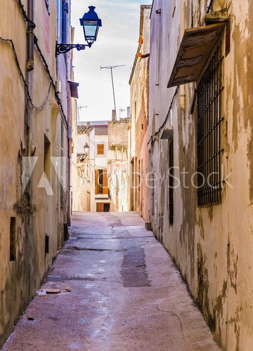 Fototapeta View of a old nostalgic mediterranean narrow alleyway