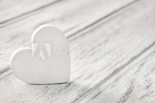 Fototapeta White heart and wooden background