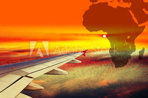 Fototapeta Wing airplane on Africa map background.