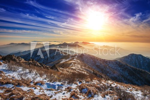 Fototapeta Winter landscape with sunset and foggy in Deogyusan mountains, S