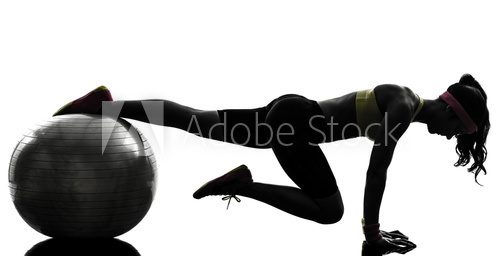Fototapeta woman exercising fitness workout plank position silhouette