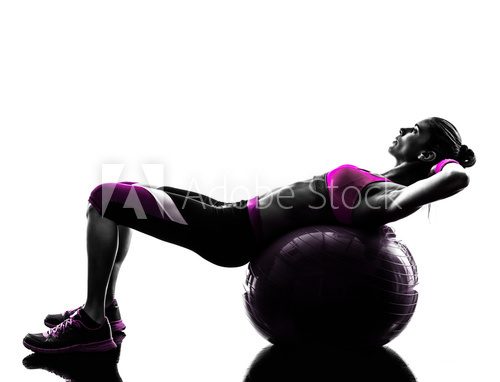Fototapeta woman fitness ball crunches   exercises silhouette