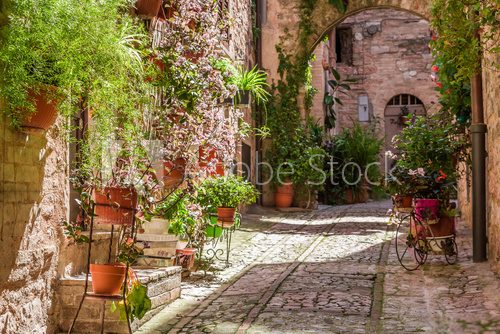 Fototapeta Wonderful decorated porch in small town in Italy in summer, Umbria