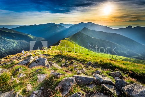 Fototapeta Wonderful sunset in mountains in summer