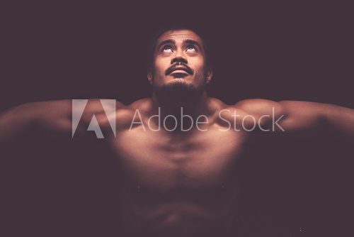 Fototapeta Young asian man with muscular upper body