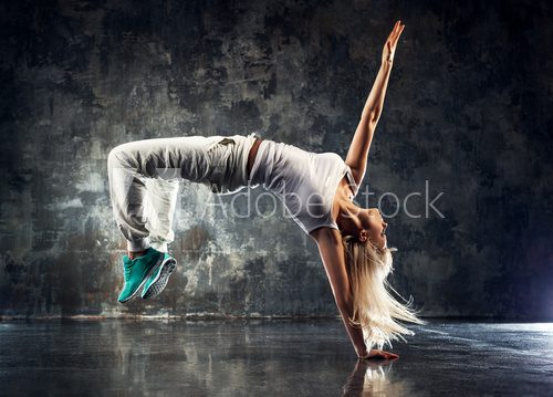 Fototapeta Young woman dancer